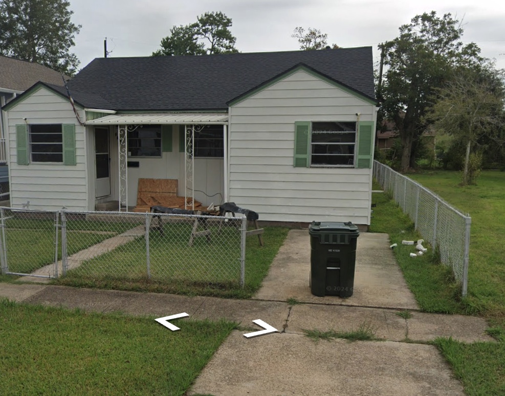 Ranch home with green shutters