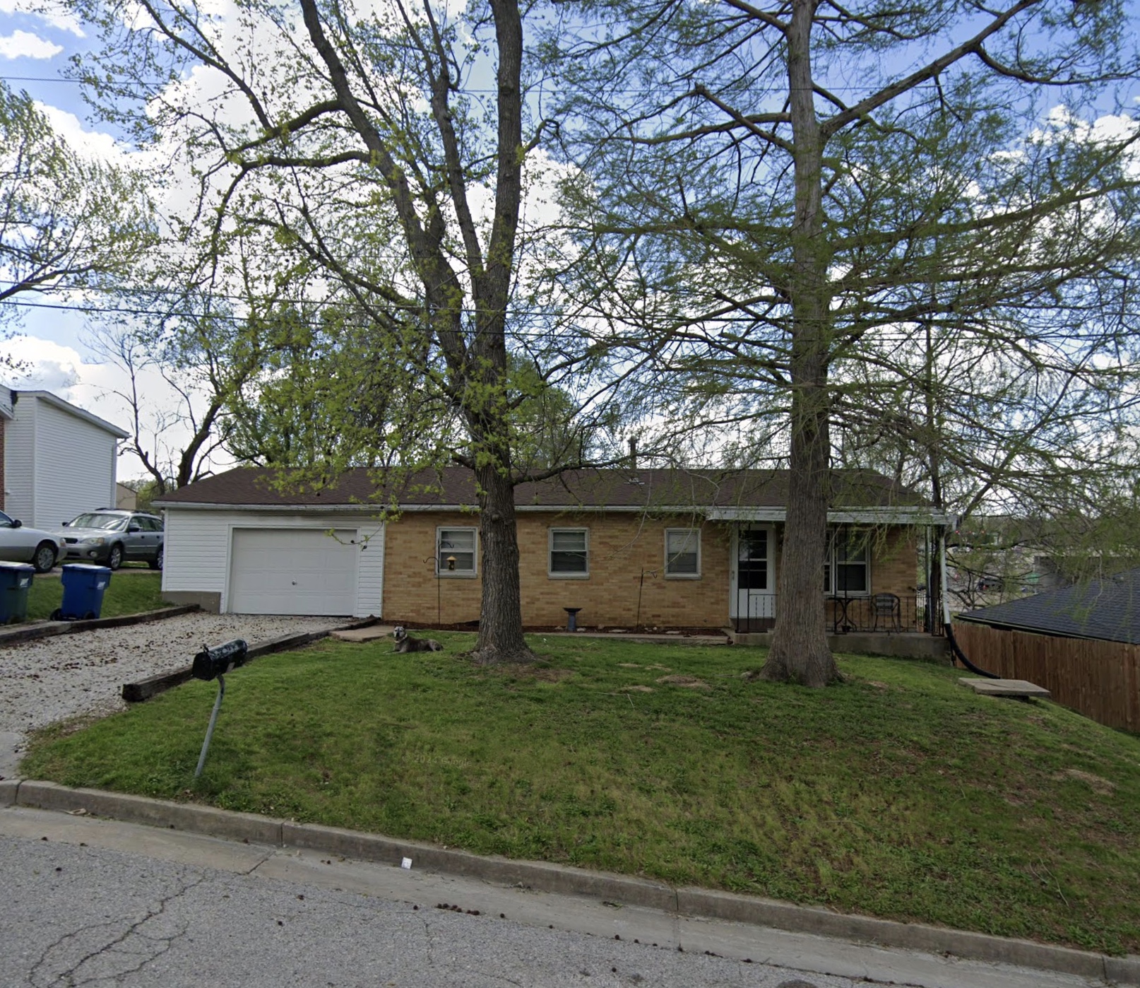 Brick ranch home with detached garage