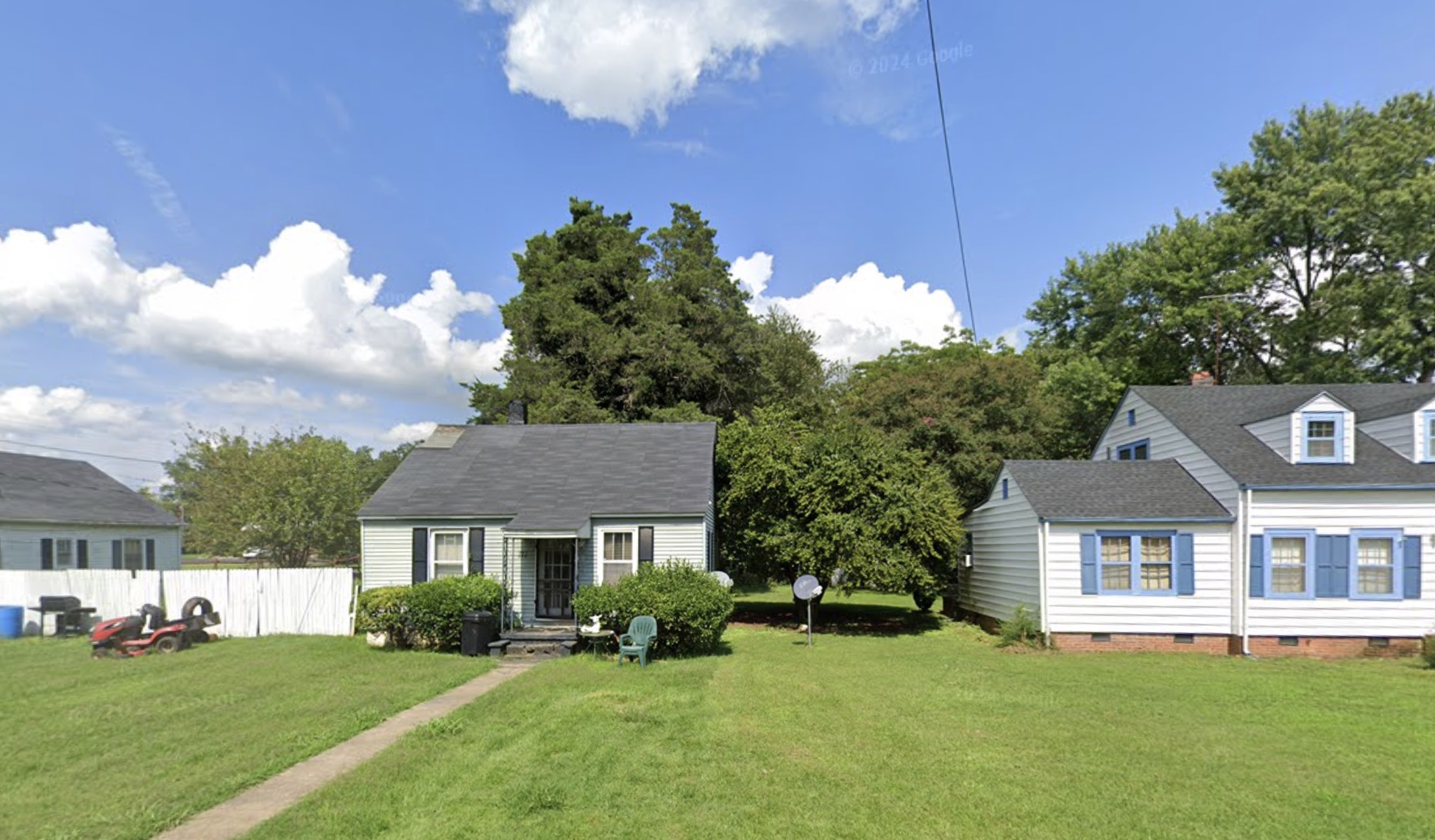 Small cottage homes on green lot